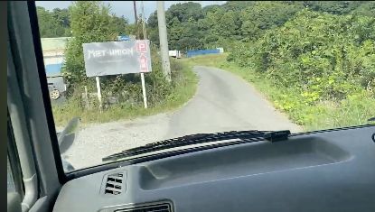 ユニオンベース東側進入路の途中にあるMETユニオン駐車場案内看板